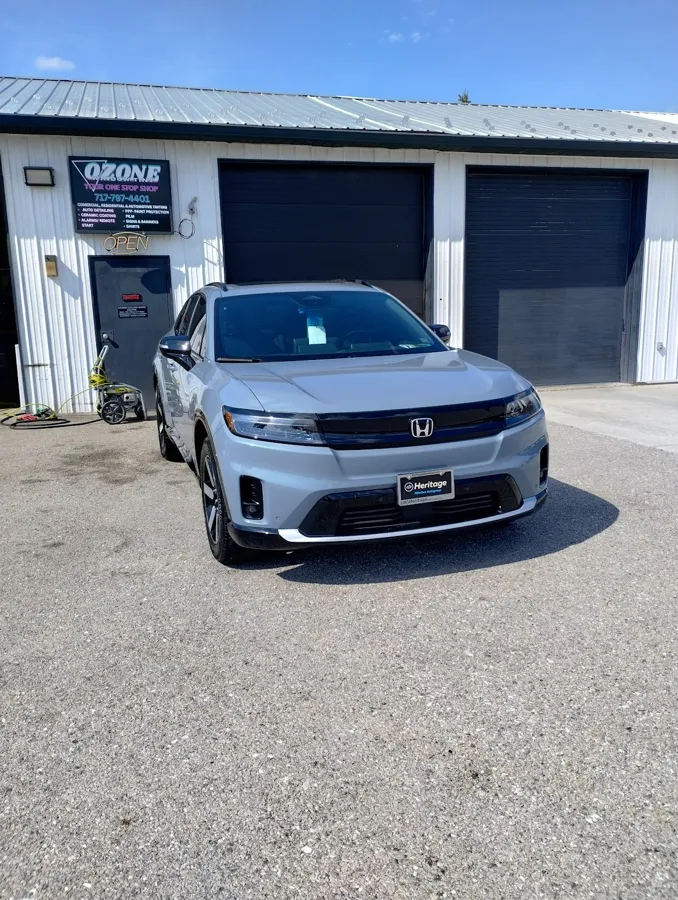 Silver Honda sedan detailed outside the Jay Wrapz shop